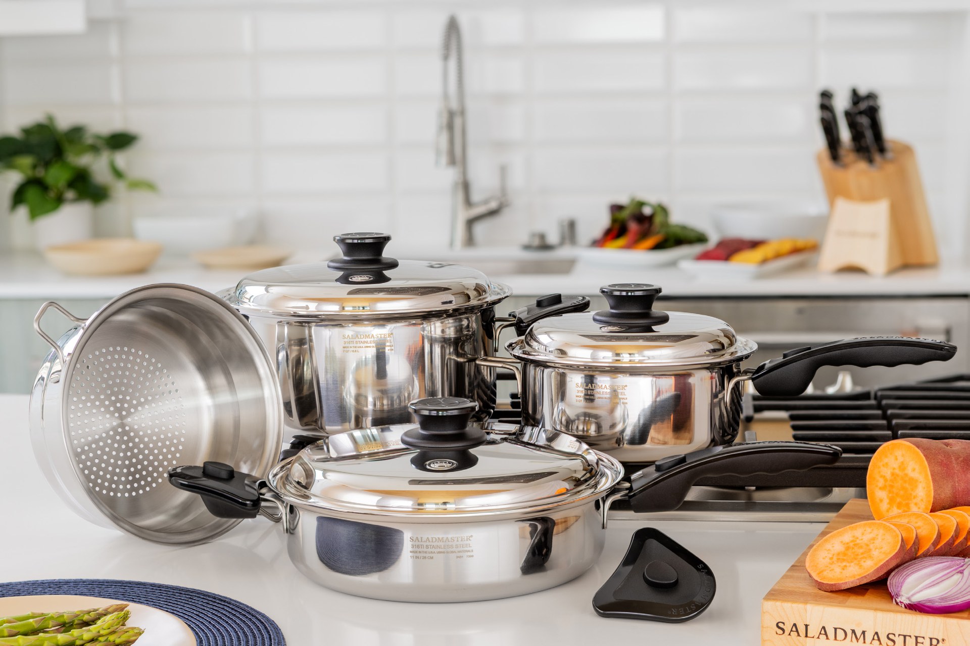 Family preparing healthy meal together with premium stainless steel cookware